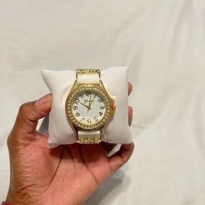 White & gold watch
